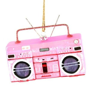 Remember when you and your girlfriends got your groove on to tunes booming out of your boombox? Celebrate the season with this nostalgic Boombox Ornament in Pink - a wonderful addition to your Christmas ornament collection this year!  Approximately 5 in. wide by 3 in. tall Made of glass.  Imported.