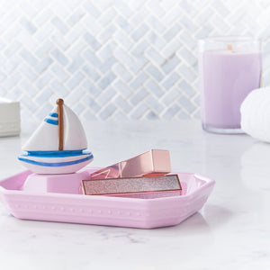 These colorful dishes will bring some cheer to your organizational tendencies! Keep candy, keys, business cards, slices of lemon and lime! you name it, the dainty dishes will hold it! And they look so cute with all the new minis! 