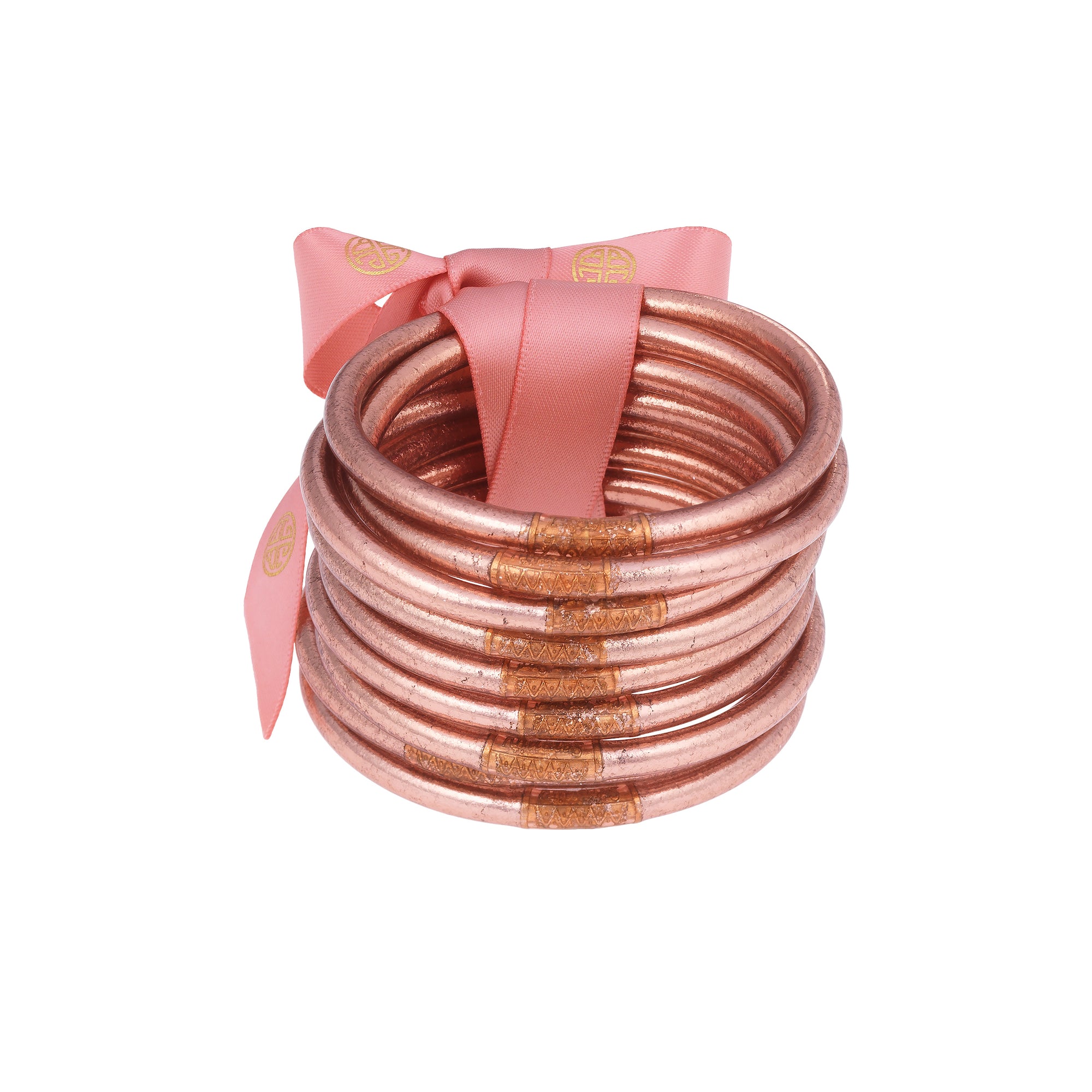 You can wear your All Weather Gold Bangles anywhere without being afraid of tarnish or any kind of sound. These Gold All Weather Bangles are made with gold leaf suspended in flexible, polyvinyl carbonate rings, and then sealed with our exclusive BuDhaGirl Serenity Prayer bead.  Set of 9 bangles.