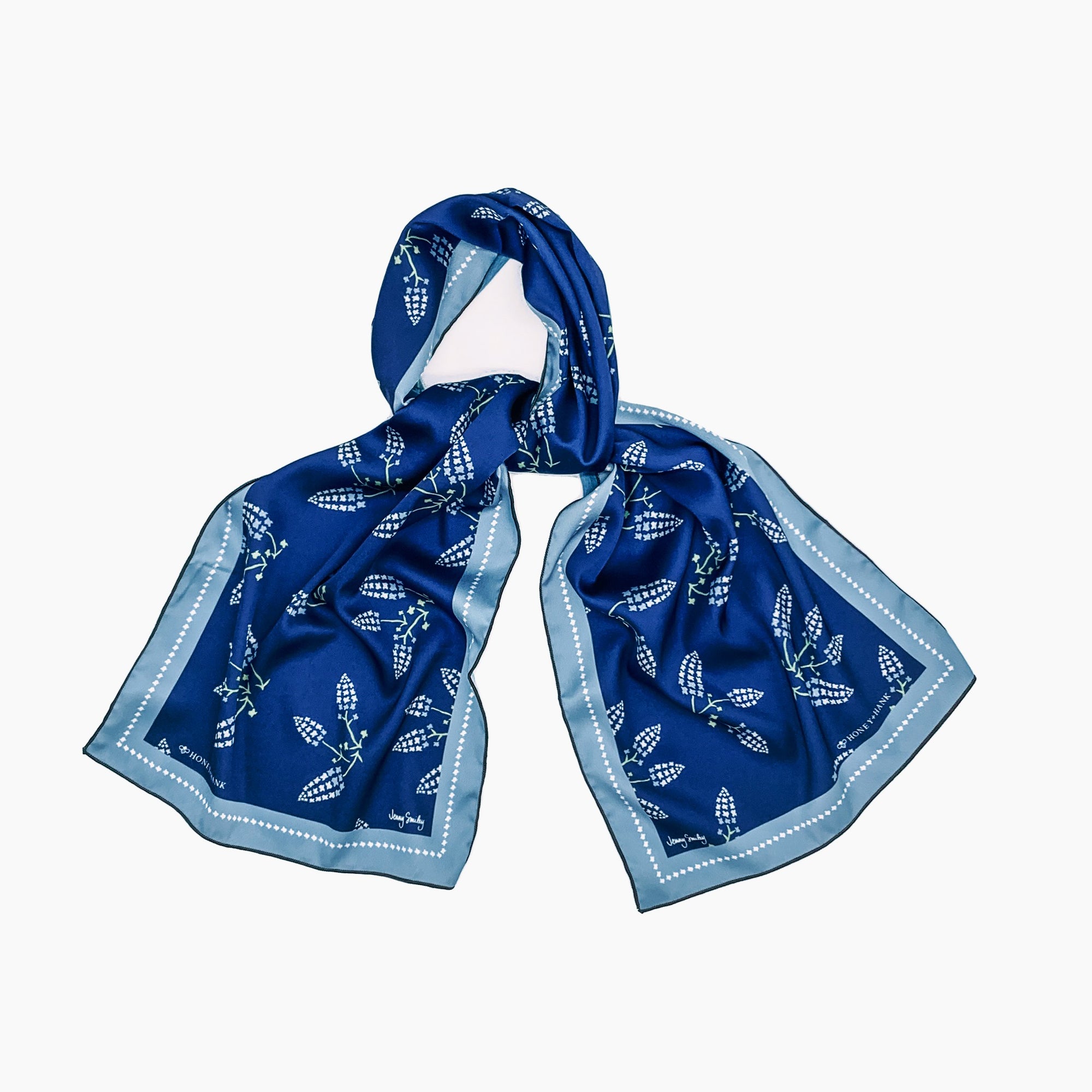 This versatile Texas Bluebonnets scarf, with hidden state icons, can be worn so many ways: around your neck, on your bag, in your hair, even tied into your boots on gameday!