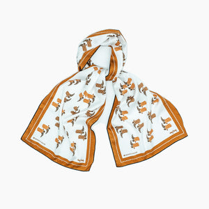 Texas silk scarf, with its hidden state design, will be as much a conversational piece as a wardrobe staple. Use is to adorn you handbag, tie it around your favorite jeans, wear it as a headband, the possibilities are endless! A great gift for yourself or someone else.  Choose from 2 styles: Texas Longhorns or Texas boots 