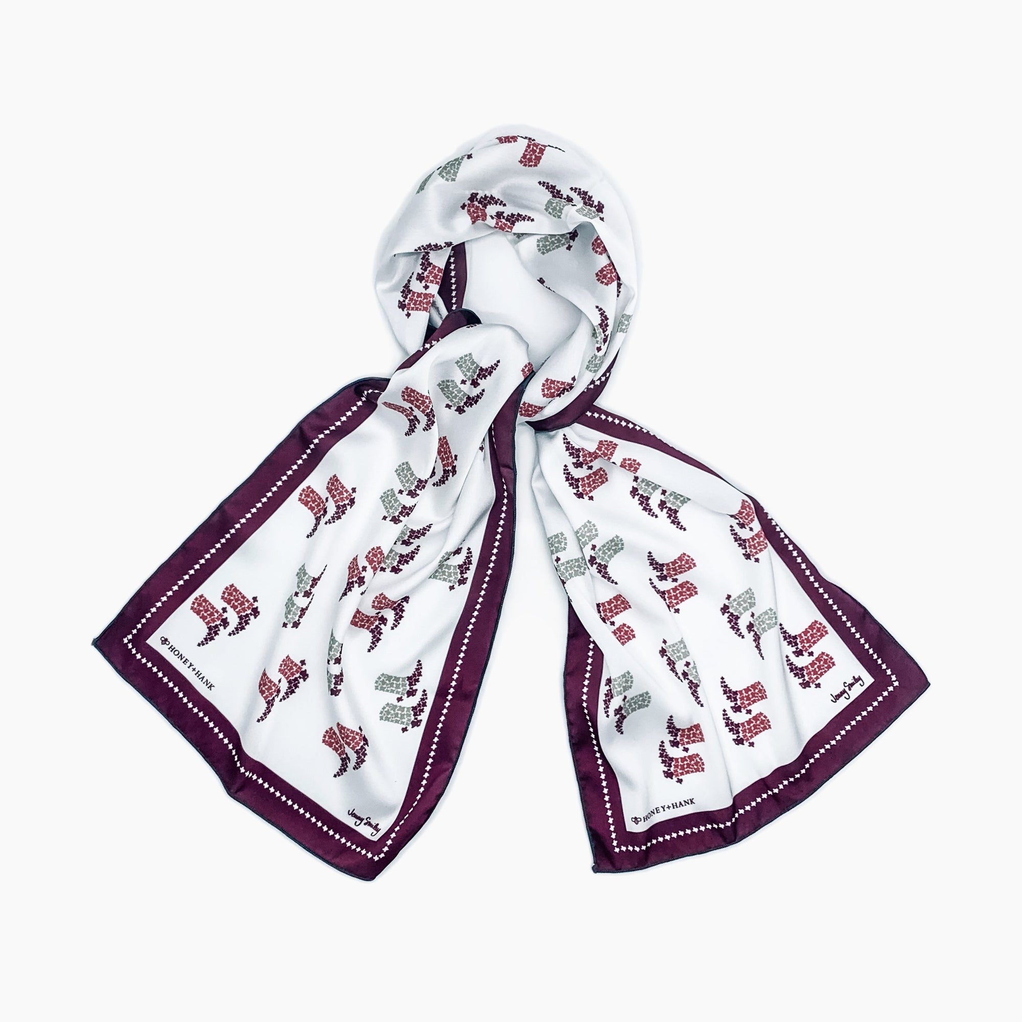 This versatile Texas Boots Scarf in Maroon, with hidden state icons, can be worn so many ways: around your neck, on your bag, in your hair, even tied into your boots on gameday!