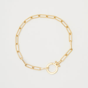 Gorjana Parker Bracelet.  Bold, yet simple, this link gold chain bracelet adds a retro vibe to your summer outfit.  It is eye catching but not overstated or bulky. 7" chain. Clasp measures approximately 3/4". Hinge closure. Available in 18k gold plated brass.